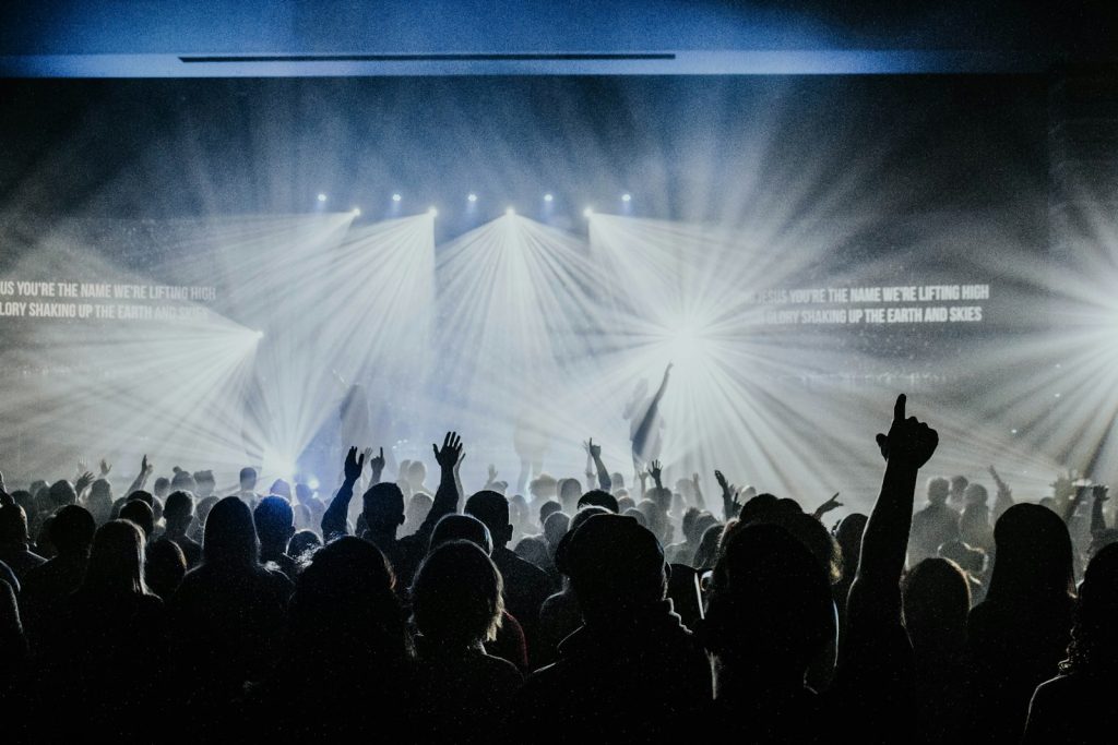 Group of people watching a concert