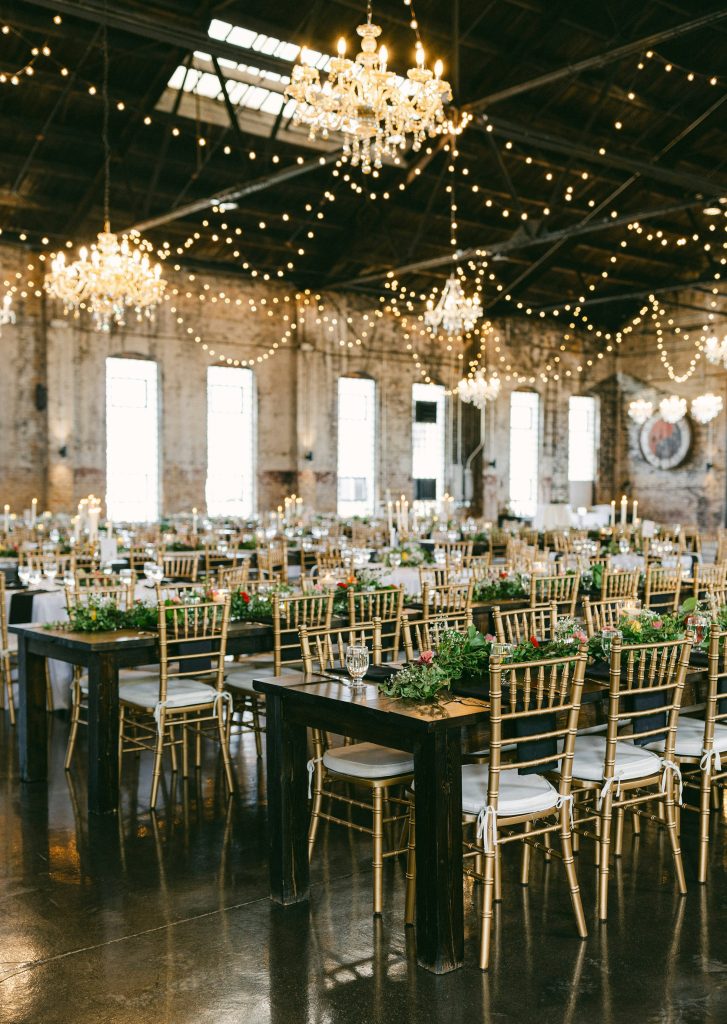 Elegant event room set with tables and chairs