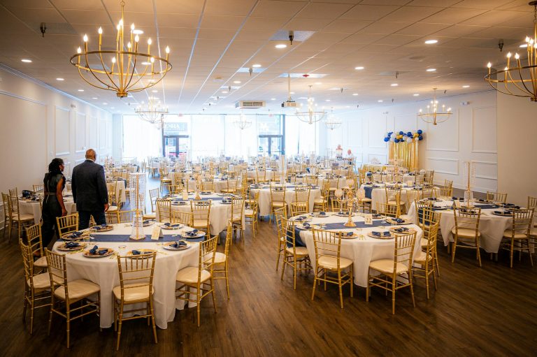 Elegant banquet hall set up with round tables, showing a flexible event layout